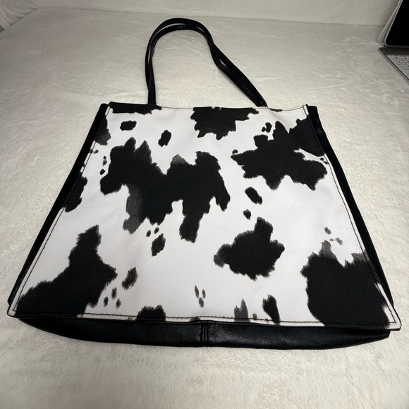Cowprint Black and White Tote Bag with a Red Interior - Picture 2 of 7